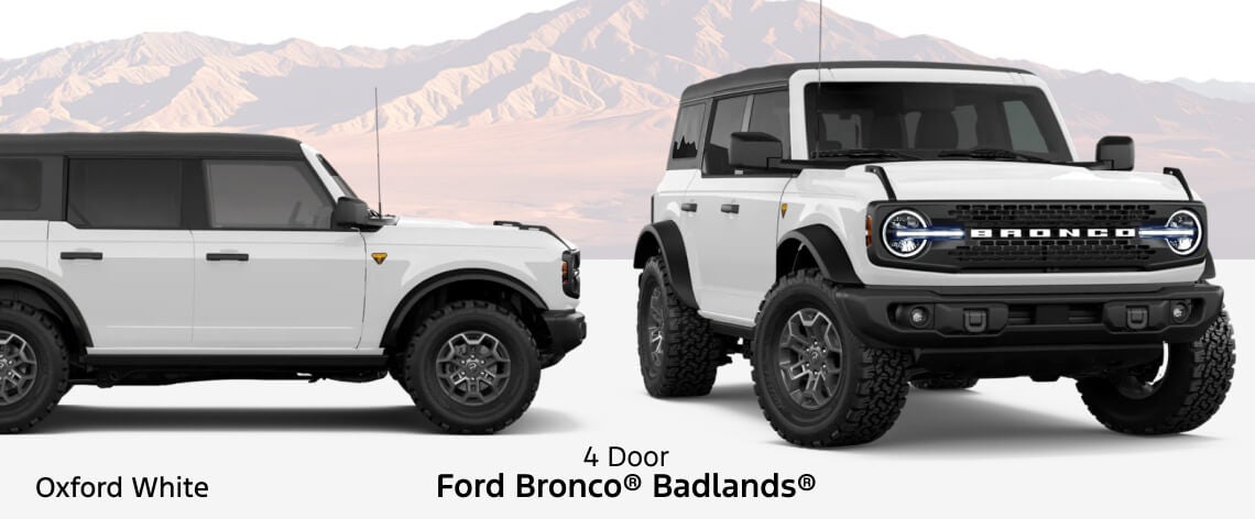 Side profile and front three-quarter view of a 2026 Ford Bronco 4-Door Badlands in Oxford White.